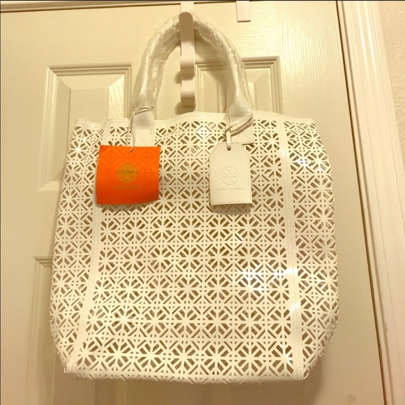 Tory Burch Handbags - NWT laser cut Tory Burch Bag! 1 day sale !!!!